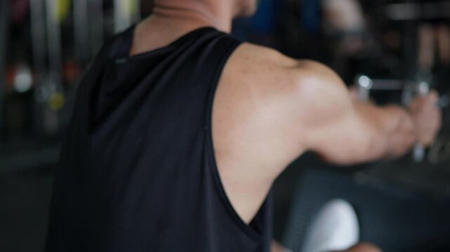 Strength training workout gym fitness exercise intense atmosphere close-up view muscle development
