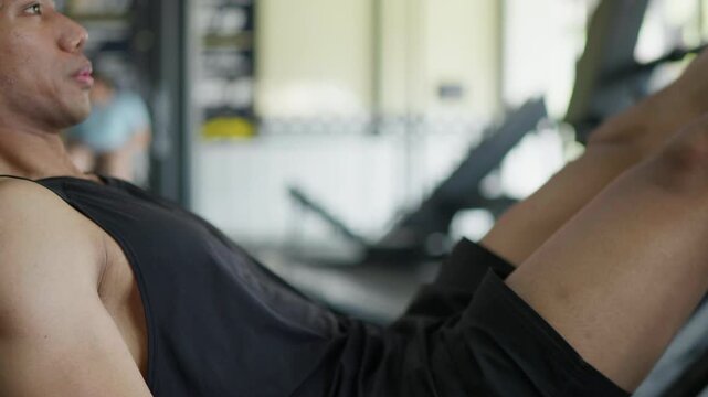 Intense leg workout session gym fitness video indoor close-up view strength training techniques for muscle growth