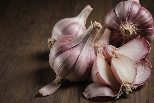 Fresh peeled garlic cloves as background, closeup