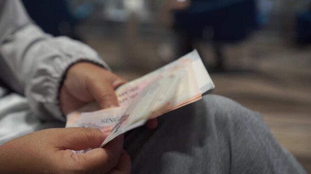 Singapore dollars money banknote counting, Financial bill for payment
