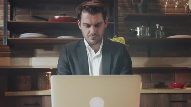 Attorney drafting contract documents, Legal professional reviewing papers with concentrated focus in dim room