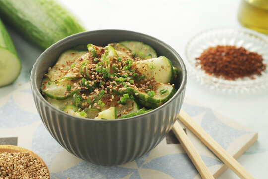 A bowl with Korean cucumber salad Oi Muchim	