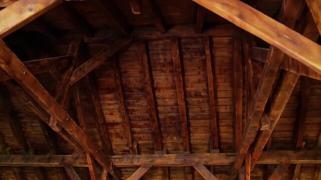 Interior View of Wooden Roof Structure with Exposed Beams