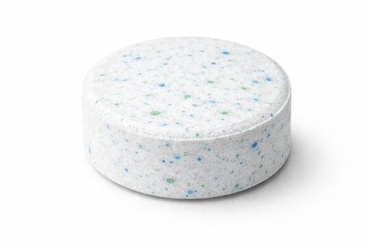 round zero waste toothpaste tablet matte is heavily speckled blue green herbal particles plastic free lifestyle sustainable daily health care