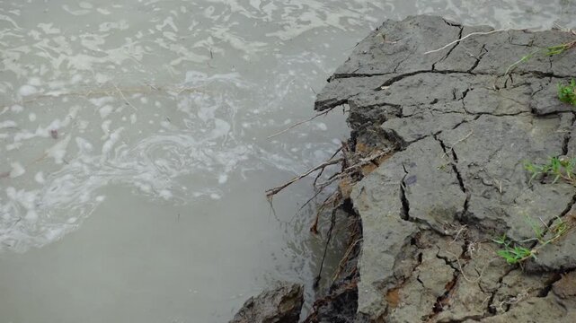 A closeup view of river erosion on a remote riverbank in Dhalchar, Bhola district.