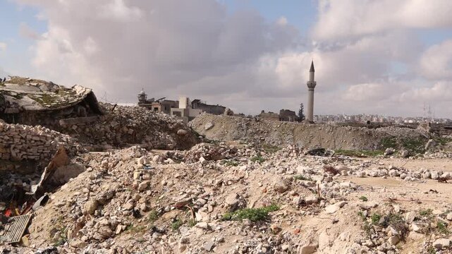 Vast area of concrete rubble and destroyed houses in Aleppo, Syria. A landscape of ruins showing the aftermath of intense shelling and urban combat