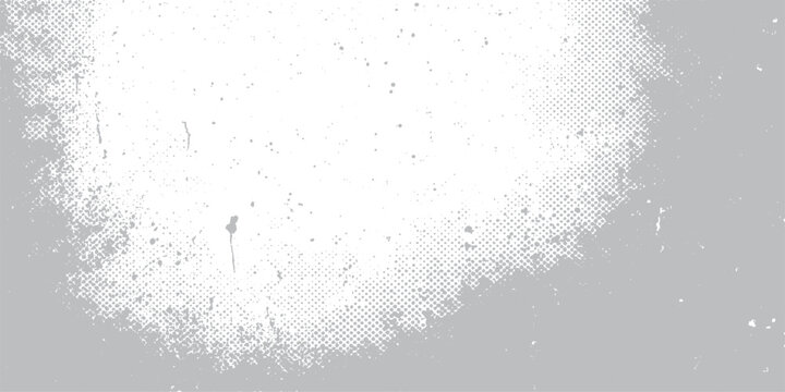 Abstract grunge background with black ink splats on a textured vintage paper surface featuring a dirty paint pattern and wet liquid drops