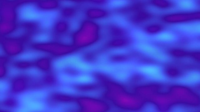 A blurred abstract image showcasing gradient color patches in a blend of blue and purple tones