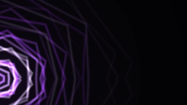 Blurry hexagonal light pattern with purple and white hues against a black background