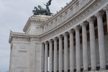 Fototapeta premium Victor Emmanuel II monument in Rome, Altare della Patria. Grand colonnade with classical columns and detailed sculptures.