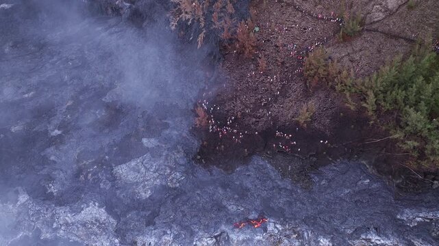 Aerial view of the volcanic landscape contrasts with the greenery of Piton de la Fournaise, Sainte Rose, Saint-Benoit, Reunion.