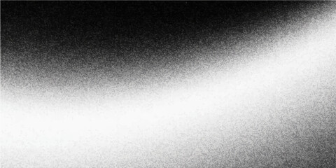 Obraz premium An abstract black and white landscape of a bright light emanating from an unknown source.