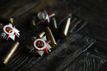 Naklejka premium Patriotic War Order and battle order for courage and bravery on George Ribbon background for the great day of Victory (russian text: Patriotic War)