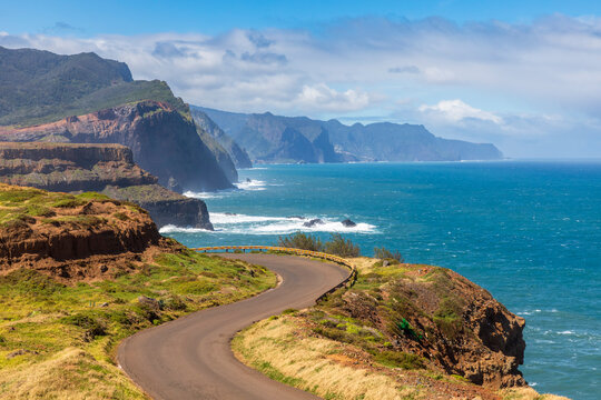 Curved road along cliffs and coastline in Cani�al Madeira Portugal