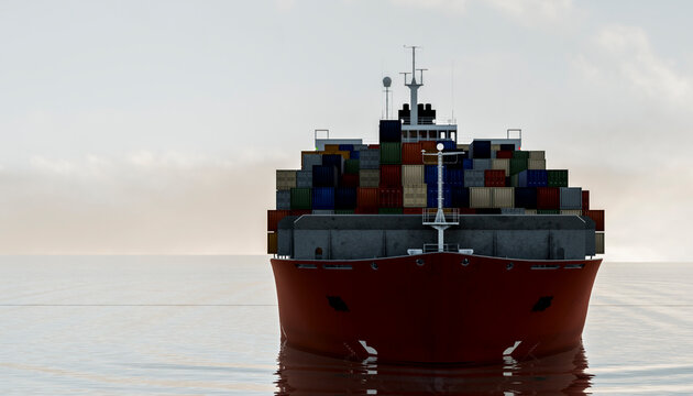 Cargo vessel with colorful containers on open sea at sunrise