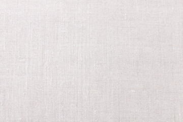 Fototapeta premium Textured linen background, natural coarse woven fabric surface, soft neutral Cloud Dancer tone, organic textile texture, light rustic backdrop, copy space for branding, wedding, packaging, stationery