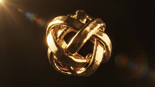 A gleaming golden knot floats in darkness, bathed in lens flare
