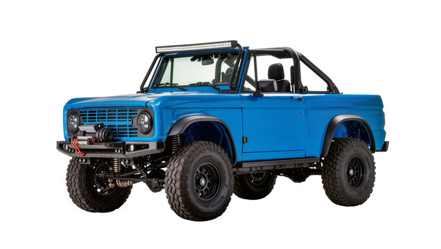 Customized blue 1970s Ford Bronco with oversized off-road tires a light bar and black roll cage, isolated on transparent background for automotive design