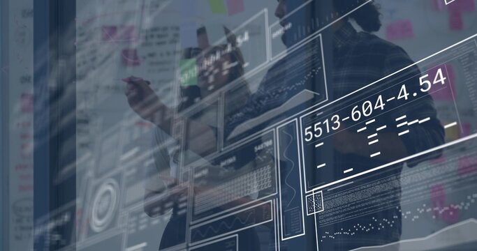 Pointing three staff wearing work clothes analyzing digital UI on office glass with sticky notes