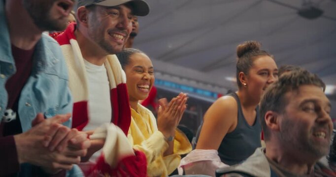 Diverse Soccer Fans in a Packed Stadium Erupt With Smiles, Shouts and Raised Arms During a Professional International League Match, Celebrating a Thrilling Championship Moment at a Major World Event.