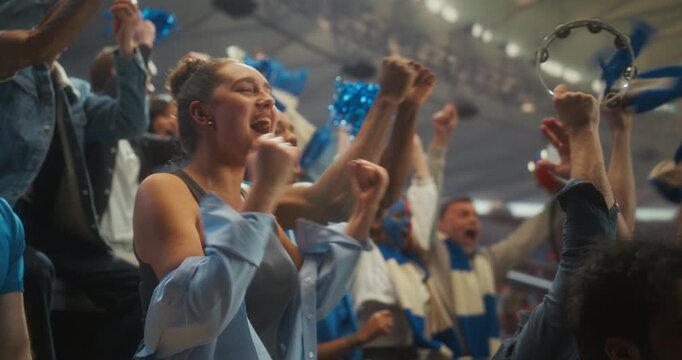 Portrait of Young White Woman and Diverse Supporters Cheer, Clap and Celebrate in a Packed Stadium During a Professional League Championship Match. International Cup Crowd Happy. Slow Motion
