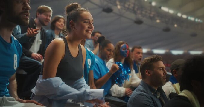 Disappointed Soccer Fans in a Packed Open Stadium React After a Crushing Loss, Shifting From Hope to Heartbreak. Diverse Supporters in Blue Sit Stunned, Frustrated, and Emotionally Drained.