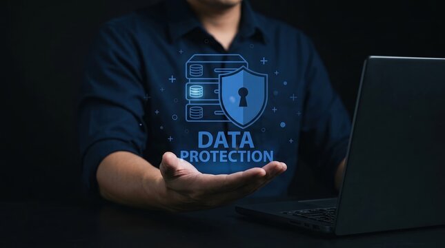 data protection, cybersecurity, digital security, information safety, privacy, network security, data privacy concept shown with professional holding virtual shield over laptop.