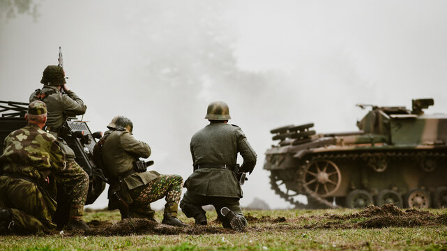 Historical reenactment of World War II, the fight between the Nazis and the Poles.