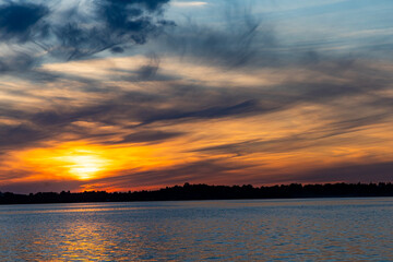 Obraz premium Colorful sunset over the lake. Mietkowski Lake, Poland