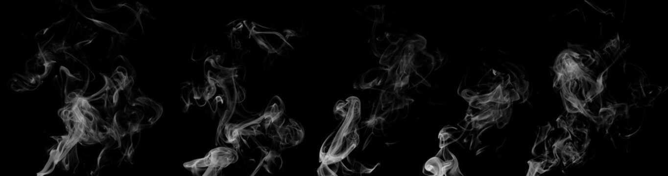 White smoke or fog isolated on black background for design elements, abstract texture, vapor effect, and atmospheric background for creative or cinematic use.