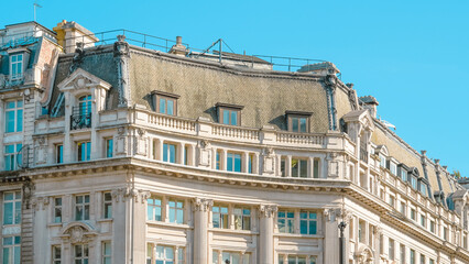 Fototapeta premium Historic building with ornate architecture under clear blue sky