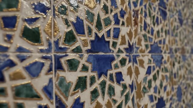 Intricate Moroccan Mosaic Tile Wall With Gold Blue Green and White Geometric Patterns
