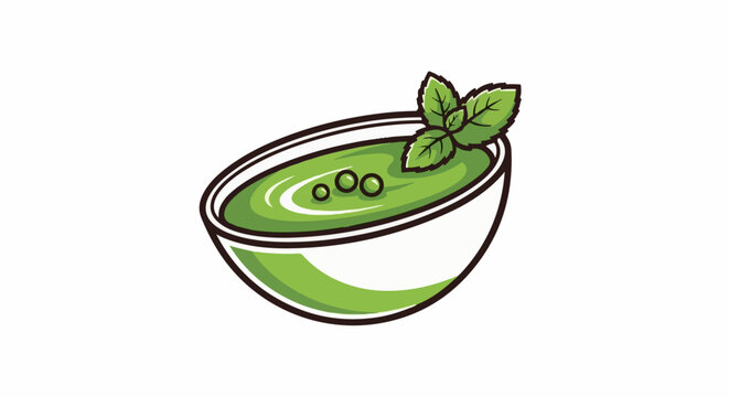 Bowl of green soup with peas and mint leaf garnish