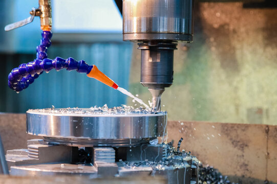 Drilling machine makes a hole in the metal product.