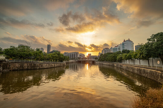 Golden Sunset Over Singapore River at Clarke Quay Cityscape