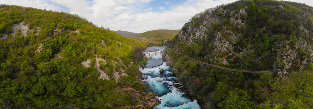Una National Park (Nacionalni park Una) in Bosnia and Herzegovina, located near Bihac, is a natural wonder famous for its emerald green waters and magnificent waterfalls.