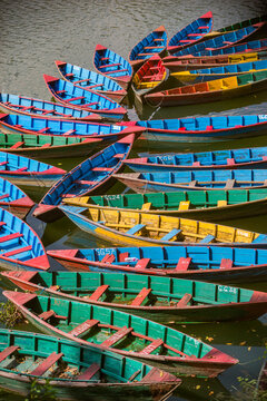 Colorful boats on the Phewa Lake. Pokhara, Nepal