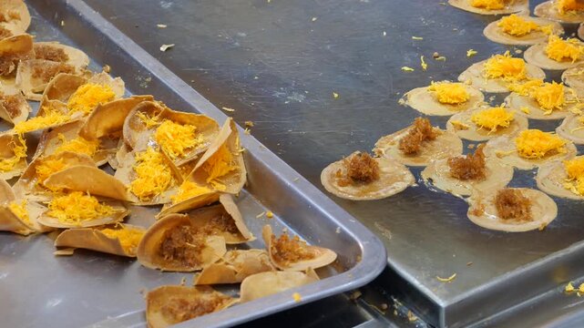 Making Thai crispy pancakes or crispy crepes (Khanom Buang), Traditional Thai snack