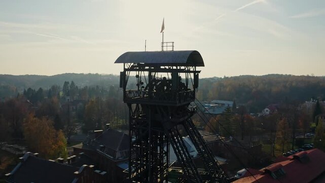 Close Drone shot around mine tower in Ostrava city