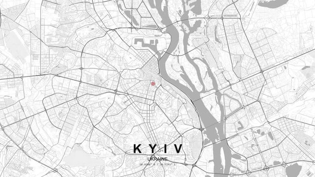 A detailed street map of Kyiv, Ukraine with a red pulsating GPS location pin marking a point, showing roads and dense urban grid from a top view.