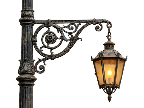Vintage street lamp with ornate wrought iron bracket and warm glowing light on white background