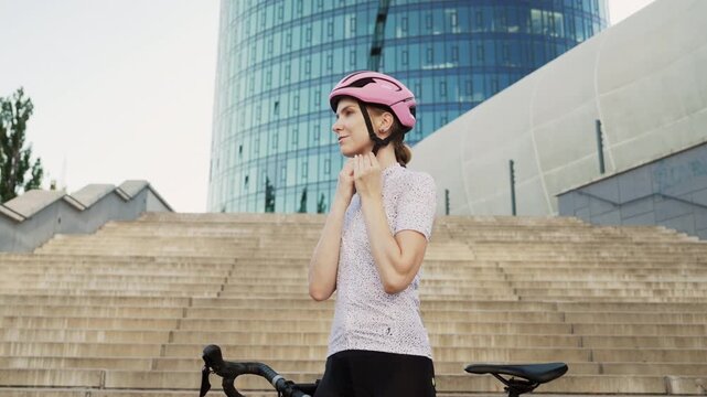 A Young Cyclist Enthusiastically Prepares for an Exciting Ride in an Urban Setting Today