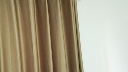 Obraz premium Brown curtain background decoration. Luxurious brown curtains in the room