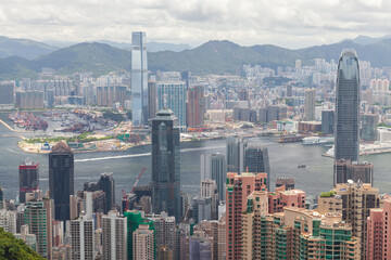 Fototapeta premium Hong Kong Central District aerial view with high-rise office buildings standing along coasts