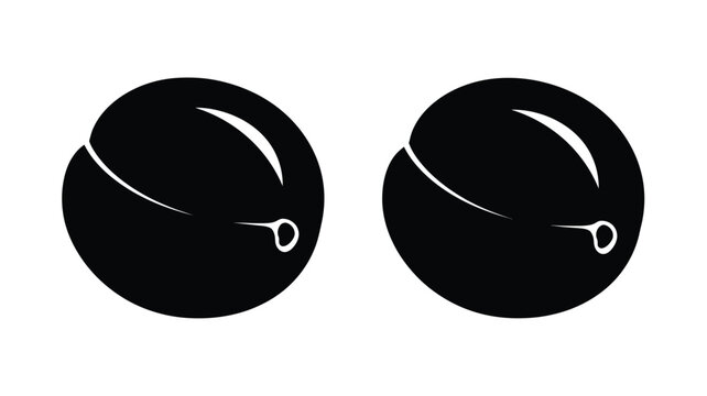 Two black plums displayed side by side in a striking silhouette