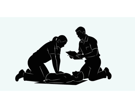 Emergency first aid training with three people, one performing CPR while another monitors the situation and takes notes.