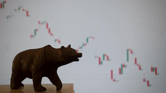 Bear market concept with silhouette of bear against falling stock chart symbolizing economic downturn, war impact, crude oil volatility, inflation pressure, recession fears and unemployment worldwide.