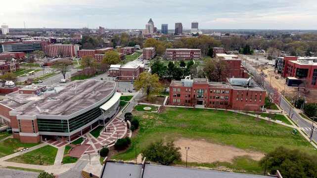 aerial push in to greensboro skyline from nc a and t state university