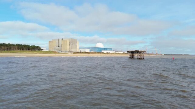 Aerial view of Sizewell B nuclear power station from the North Sea, massive pressurized water reactor and energy infrastructure on the Suffolk coast, United Kingdom.
