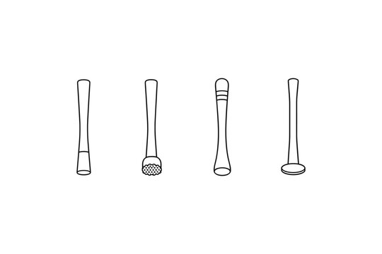 Collection of four different bar muddlers and pestles for cocktail preparation